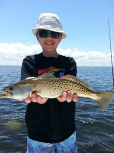 Kid Fishing Trout in Tampa Bay